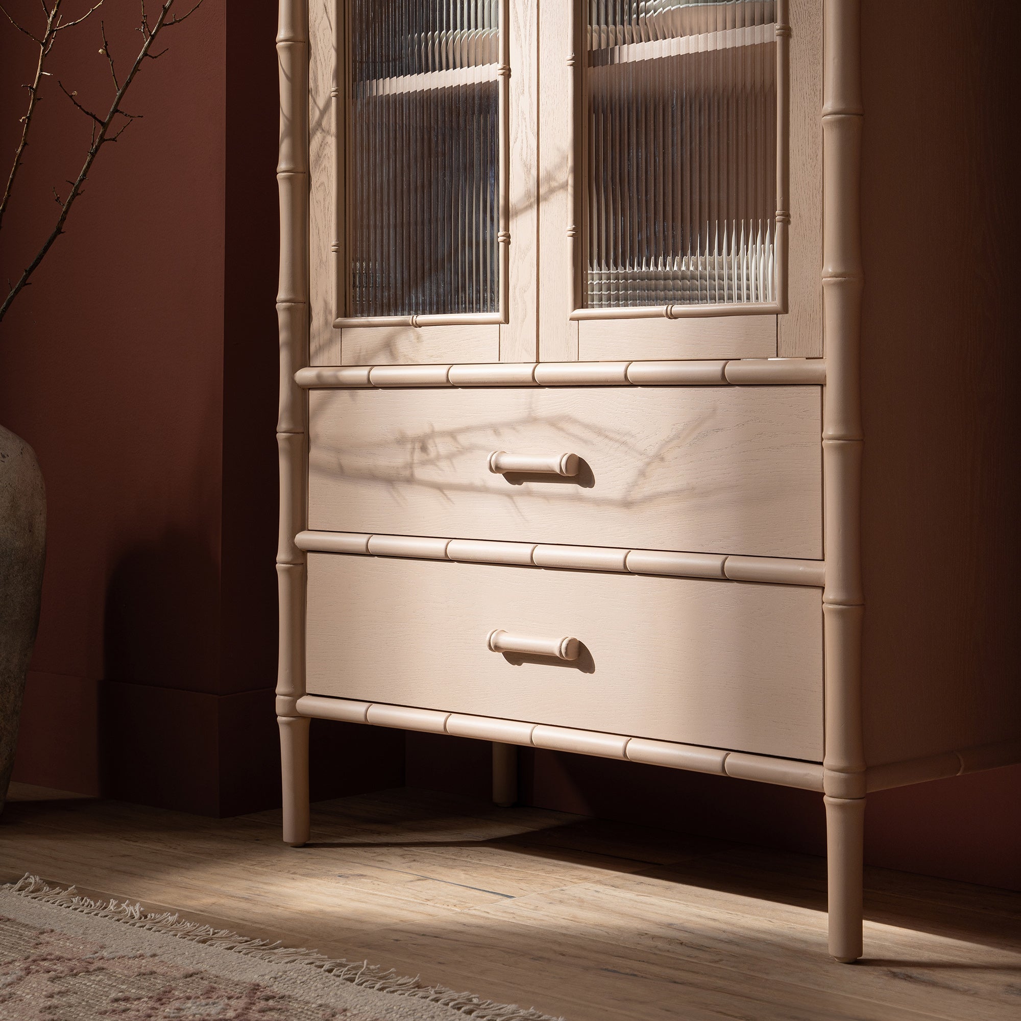 Elstowe Faux Bamboo and Fluted Glass 2-Door Cabinet, Nude Pink
